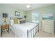 Inviting bedroom featuring a comfortable bed, soft lighting, and stylish furnishings for a relaxing and peaceful atmosphere at 181 Sea Cotton Cir, Charleston, SC 29412