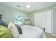 Serene bedroom featuring a plush bed, soft lighting, and a closet, creating a peaceful retreat for rest and relaxation at 181 Sea Cotton Cir, Charleston, SC 29412