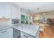 Modern kitchen with granite countertops, stainless steel appliances, and a wine rack at 181 Sea Cotton Cir, Charleston, SC 29412