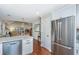 Spacious kitchen featuring stainless steel appliances, granite countertops, and an open layout to the living space at 181 Sea Cotton Cir, Charleston, SC 29412