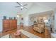 Spacious living room showcasing hardwood floors, high ceilings, and comfortable seating for relaxing or entertaining guests at 181 Sea Cotton Cir, Charleston, SC 29412