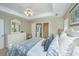 Spacious main bedroom with a large bed and a bathroom at 181 Sea Cotton Cir, Charleston, SC 29412
