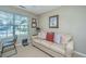 Bright office space featuring a comfortable couch, providing an ideal environment for working or relaxing at 181 Sea Cotton Cir, Charleston, SC 29412