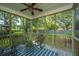 Inviting screened porch with comfortable seating at 181 Sea Cotton Cir, Charleston, SC 29412