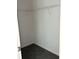 Empty closet with metal shelving and neutral carpeting provides storage solutions at 18441 Round O Rd, Round O, SC 29474