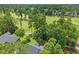 Stunning aerial view of a lush golf course community with mature trees and well-manicured lawns at 195 Prestwick Ct, Summerville, SC 29483