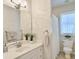 Well-lit bathroom with neutral finishes, decorative plants, and modern fixtures at 195 Prestwick Ct, Summerville, SC 29483