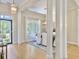 Light-filled dining room featuring modern chandelier and ample seating with backyard access at 195 Prestwick Ct, Summerville, SC 29483