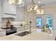 Bright kitchen featuring marble countertops, stainless steel appliances and white cabinetry at 195 Prestwick Ct, Summerville, SC 29483