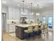 Modern kitchen featuring a center island with bar seating and stainless steel appliances at 195 Prestwick Ct, Summerville, SC 29483