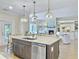 Open kitchen area featuring a large island and open access to the living room at 195 Prestwick Ct, Summerville, SC 29483