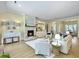 Bright living room featuring a fireplace, built-in shelves, and comfortable seating at 195 Prestwick Ct, Summerville, SC 29483