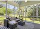 Spacious screened porch offering scenic backyard views and comfortable outdoor living at 195 Prestwick Ct, Summerville, SC 29483