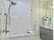 Modern shower with white subway tile, glass enclosure, rainfall shower head and marble bench at 195 Prestwick Ct, Summerville, SC 29483