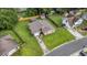 Aerial view of the home showcases a large yard, mature trees and long driveway at 212 Kentucky Dr, Ladson, SC 29456