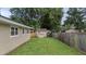 The yard is fenced in and contains a storage shed with space for activities at 212 Kentucky Dr, Ladson, SC 29456