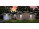 Charming single-story brick home with well-manicured lawn and attached garage on a tree-lined street at 212 Kentucky Dr, Ladson, SC 29456