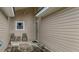 Outdoor patio area with seating, ideal for relaxing or entertaining at 212 Kentucky Dr, Ladson, SC 29456