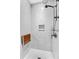 Contemporary shower with subway tile surround, built-in niche, and convenient fold-down seat at 212 Kentucky Dr, Ladson, SC 29456
