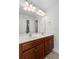 Bathroom featuring a double sink vanity, white counter tops and wood cabinets at 213 Crossandra Ave, Summerville, SC 29483