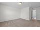 Empty bedroom with carpet and a view to another room at 213 Crossandra Ave, Summerville, SC 29483