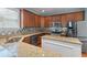 Well-equipped kitchen with granite countertops and stainless steel appliances at 213 Crossandra Ave, Summerville, SC 29483