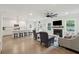 Bright and airy living space featuring hardwood floors, a fireplace, and ample seating at 217 7Th Ave, Mount Pleasant, SC 29464