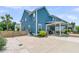 Spacious backyard with a covered patio, perfect for outdoor entertaining and relaxation at 2219 Kemmerlin St, Johns Island, SC 29455