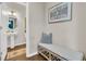 Clean and modern half-bathroom featuring a pedestal sink, decorative art, and stylish design at 2219 Kemmerlin St, Johns Island, SC 29455