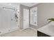 Bathroom showcasing a glass enclosed shower, bright window and stylish tile flooring at 2219 Kemmerlin St, Johns Island, SC 29455