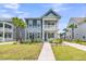 Charming two-story home with a double porch, landscaped yard, and inviting curb appeal in a vibrant neighborhood at 2219 Kemmerlin St, Johns Island, SC 29455