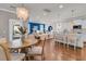 Expansive open-concept living space with elegant dining area, comfortable living room, and modern kitchen at 2219 Kemmerlin St, Johns Island, SC 29455