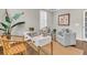 Cozy home office with a modern white desk, stylish decor, and natural light for a productive workspace at 2219 Kemmerlin St, Johns Island, SC 29455