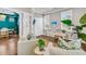 Bright home office with desk and chair setup, natural light, and view into the dining room at 2219 Kemmerlin St, Johns Island, SC 29455