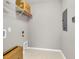 Functional storage room with shelving, modern flooring, and essential utility connections for organization at 2219 Kemmerlin St, Johns Island, SC 29455