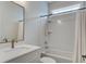 Bright bathroom features a single vanity, bathtub, and shower at 2241 Dewees Creek Dr, Mount Pleasant, SC 29466