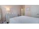 Charming bedroom featuring neutral walls, white furnishings, and natural light, creating a serene and comfortable space at 2241 Dewees Creek Dr, Mount Pleasant, SC 29466