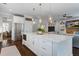 Modern kitchen featuring a large island, pendant lighting, and stainless steel appliances at 2241 Dewees Creek Dr, Mount Pleasant, SC 29466