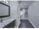 Bathroom featuring a marble-tiled walk-in shower, a modern vanity, and sleek fixtures at 242 Cheyenne Rd, Summerville, SC 29483