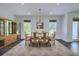 Bright dining room with stylish rug, lighting, and decor at 242 Cheyenne Rd, Summerville, SC 29483