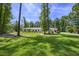 Charming home with a well-manicured lawn and mature trees in a peaceful setting at 242 Cheyenne Rd, Summerville, SC 29483