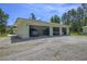 A three car garage provides ample storage for vehicles and equipment at 242 Cheyenne Rd, Summerville, SC 29483