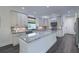 Bright kitchen featuring white cabinets, granite countertops, recessed lighting, and modern appliances at 242 Cheyenne Rd, Summerville, SC 29483