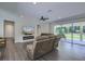 Comfortable living room with fireplace, hardwood floors, and natural light at 242 Cheyenne Rd, Summerville, SC 29483