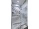 Modern walk-in shower featuring decorative marble tile surround and a glass door at 242 Cheyenne Rd, Summerville, SC 29483