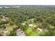 Aerial view of a home surrounded by lush greenery and trees at 245 Lake Dr, Summerville, SC 29483