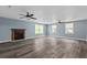 Spacious living room features a decorative fireplace and plenty of natural light at 245 Lake Dr, Summerville, SC 29483
