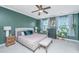 Beautiful bedroom with plush carpet, stylish fan, and decorative plants that enhance the room's ambiance at 246 Slipper Shell Ct, Mount Pleasant, SC 29464