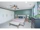 Serene bedroom featuring a king bed, spacious closet, and neutral tones for a calming atmosphere at 246 Slipper Shell Ct, Mount Pleasant, SC 29464