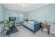 Comfortable bedroom featuring a daybed, stylish decorations, and an exercise bike for fitness enthusiasts at 246 Slipper Shell Ct, Mount Pleasant, SC 29464